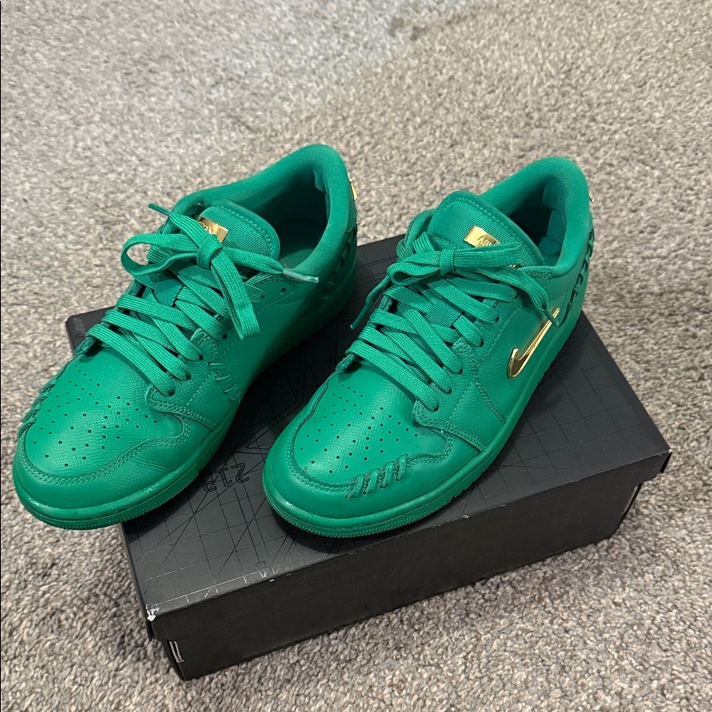 Nike Air Jordan 1 Low Green and Gold Athletic Shoes